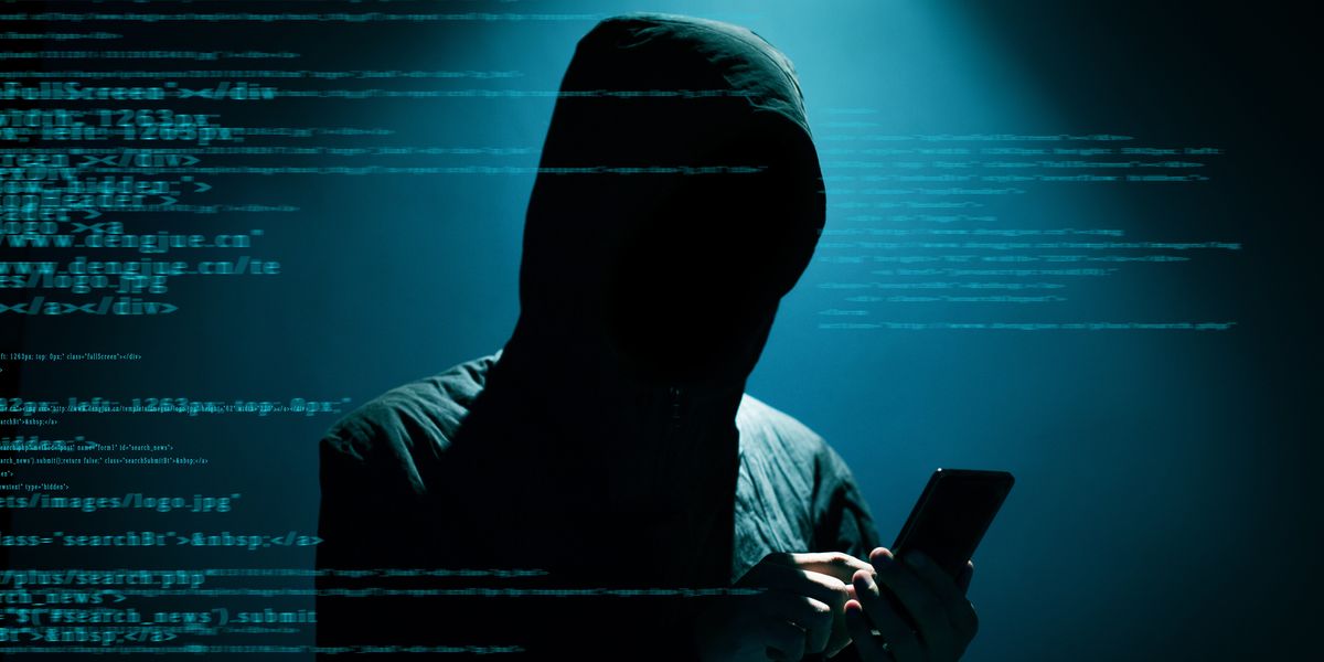 Hacker on smartphone