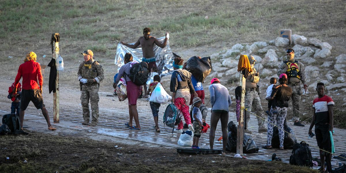 Haitian immigrants crossing the Rio Grande into Texas