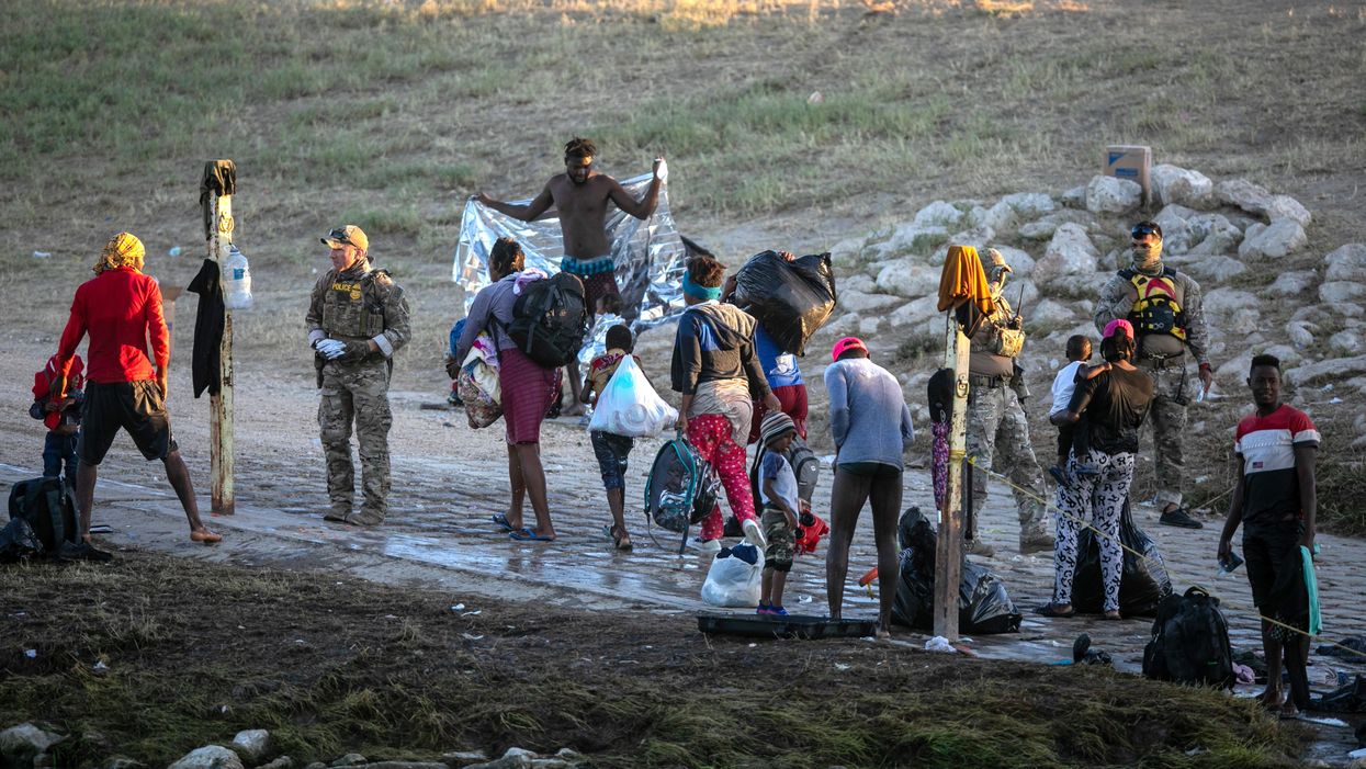 Haitian immigrants crossing the Rio Grande into Texas