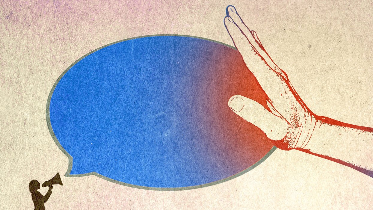 Hand blocking someone speaking