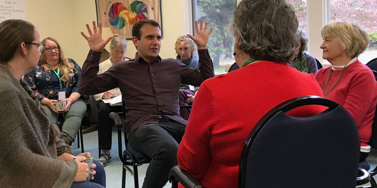 Hands Across the Hill meeting