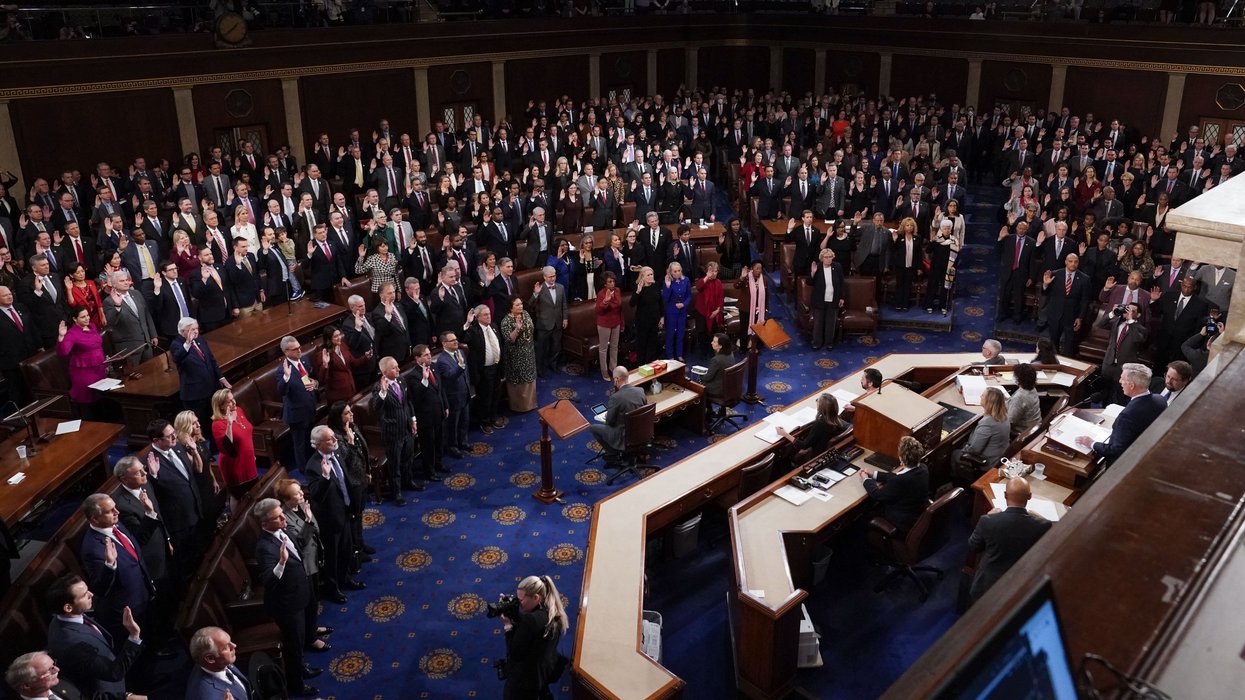 House members taking the oath of office in the chamber