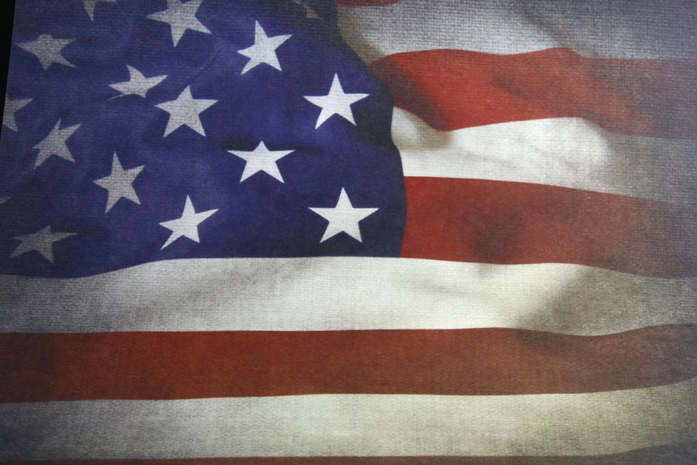 Image of American flag waving in the breeze. 