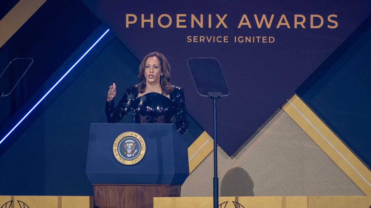 Kamala Harris speaking at a podium