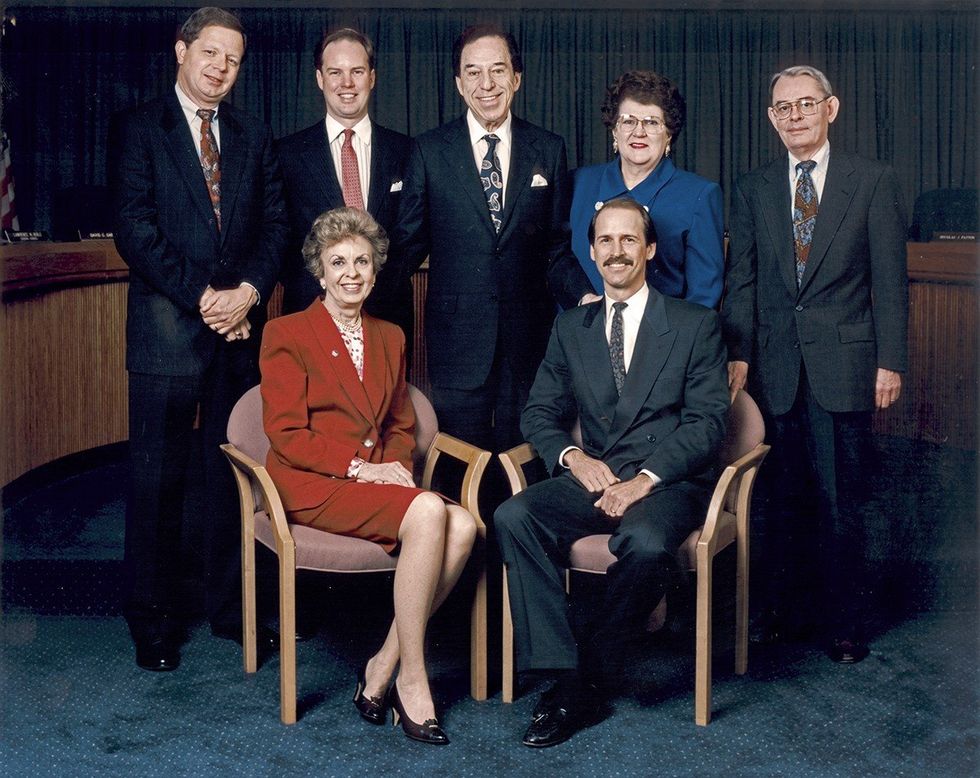 (Left to Right) Sitting - Chair Joan D. Aikens, Vice Chairman Scott E. Thomas. Standing - Commissioners Danny HL. McDonald, Trevor Potter, John W. McGarry, Lee Ann Elliott, Senate Ex-Officio David G. Gartner