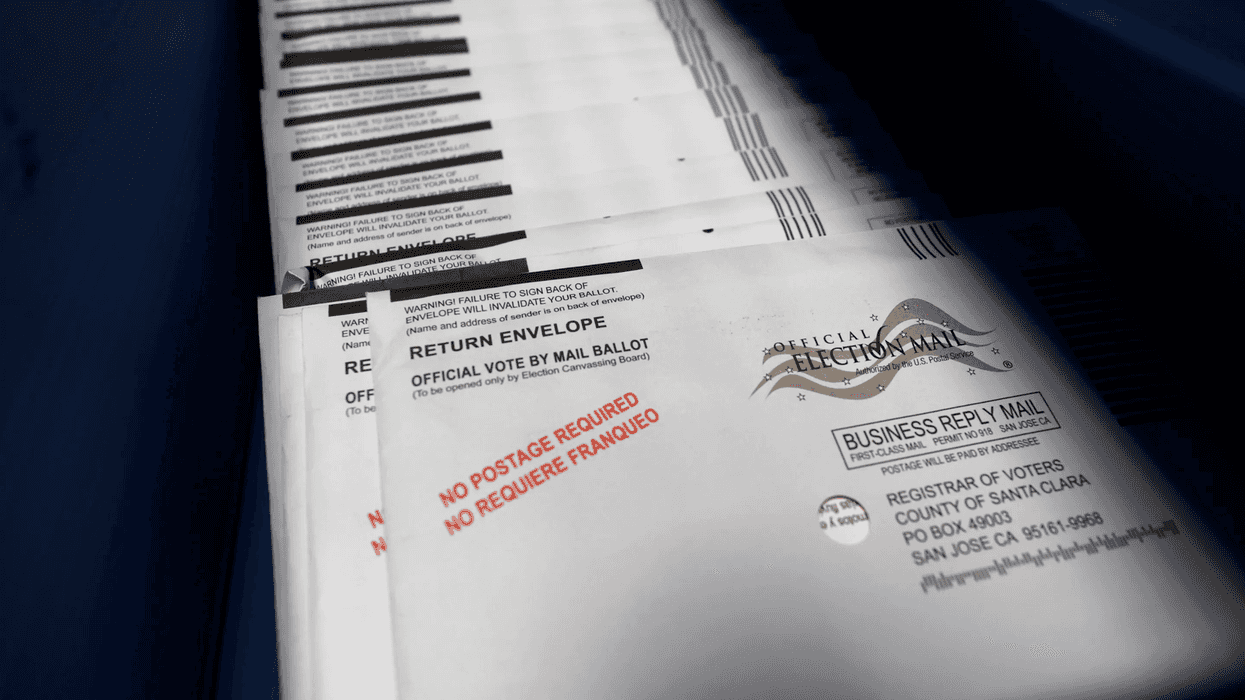 Mail-in ballots sitting in trays.