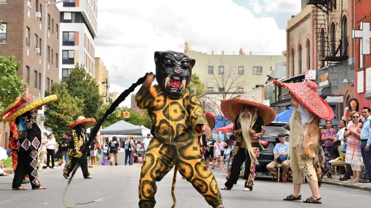 Man dressed in jaguar costume