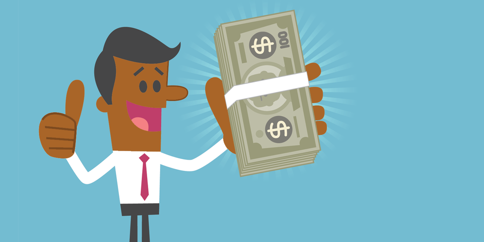 Man holding a stack of dollars and giving a thumbs up
