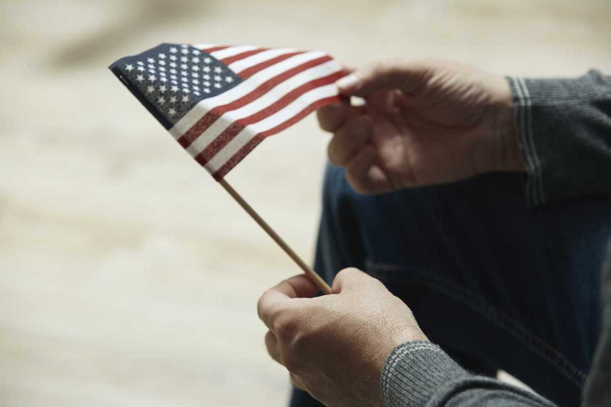 Man holding American flag