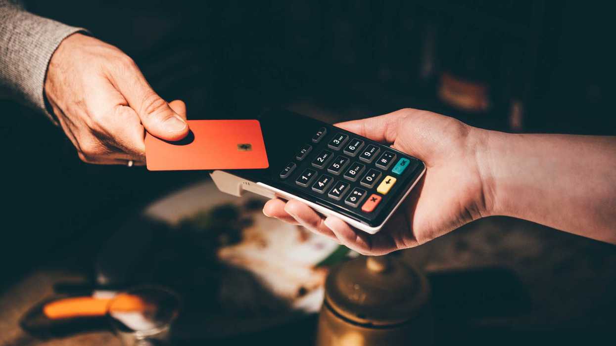 Man pays with a card.