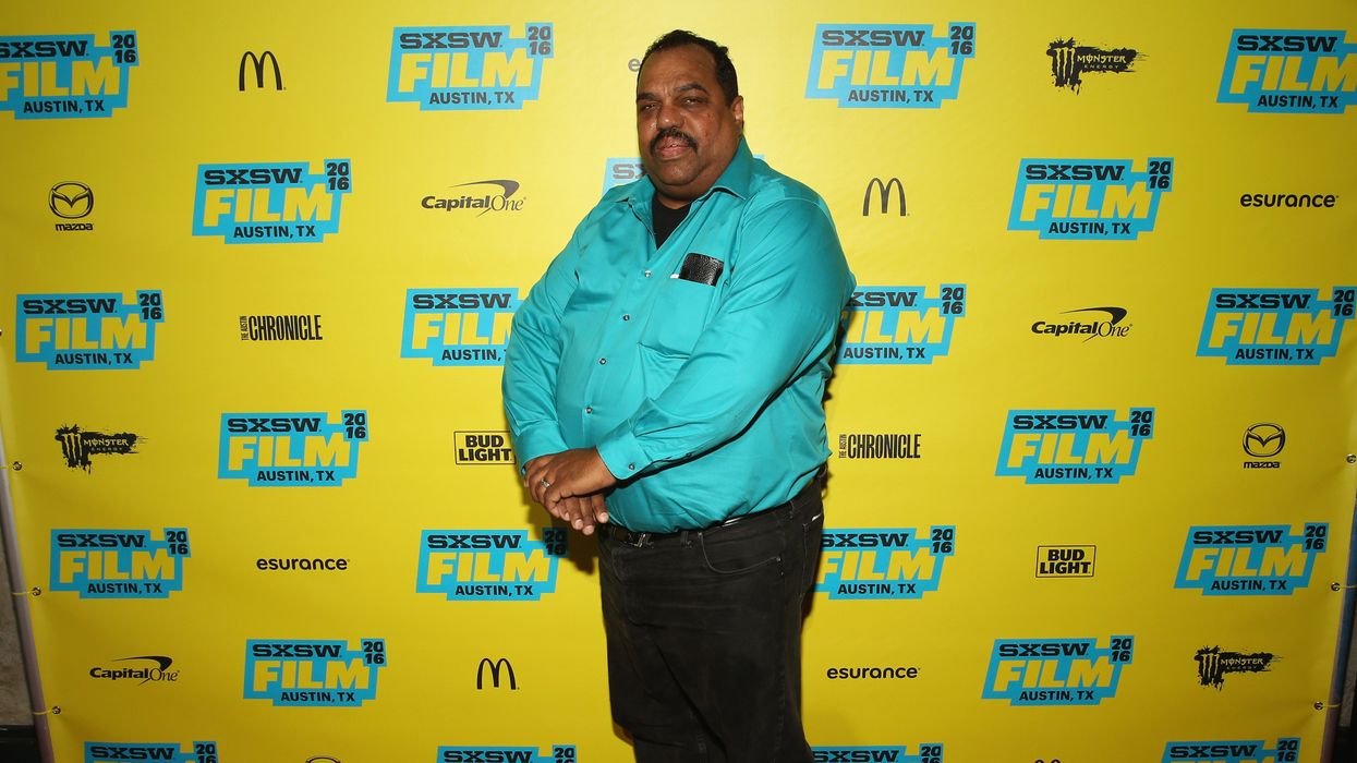 Man standing in front of a SXSW backdrop