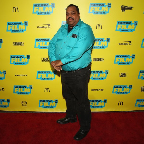 Man standing in front of a SXSW backdrop