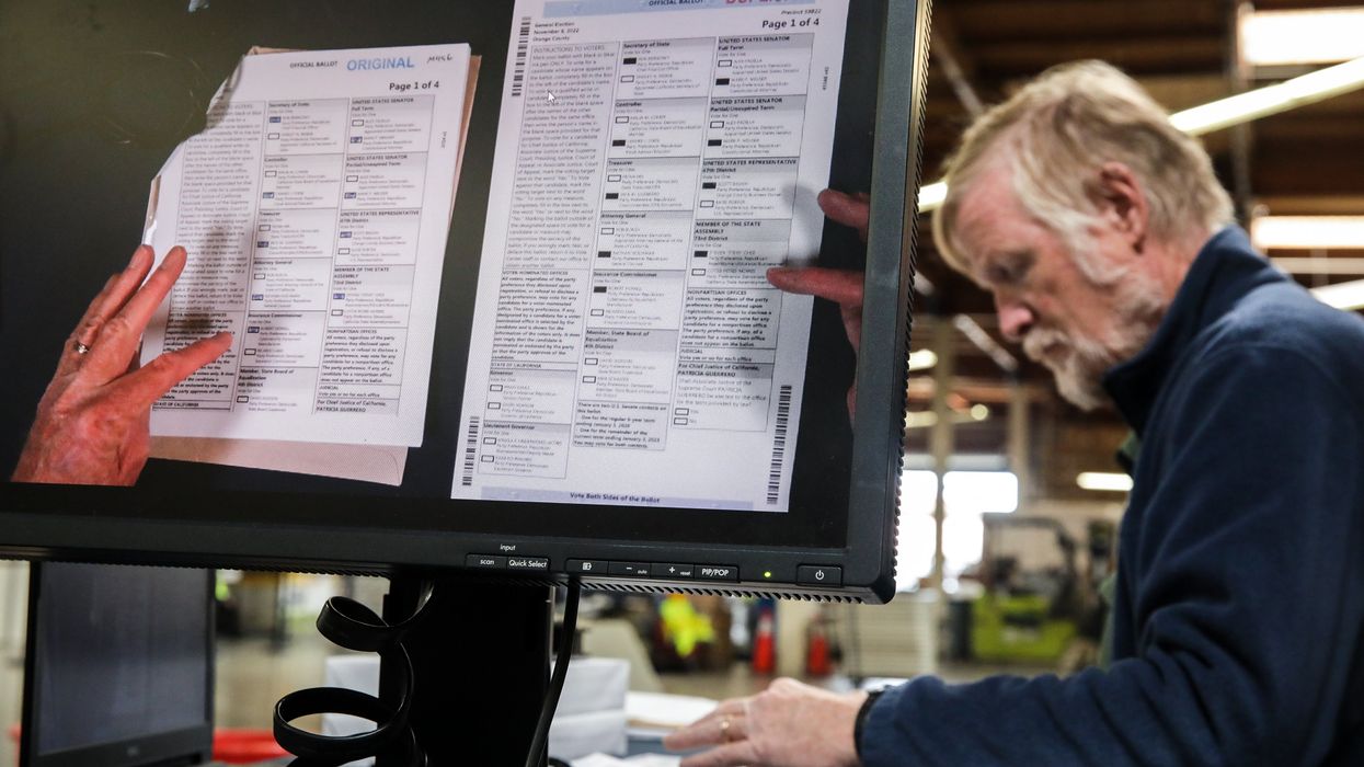 Man tabulating ballots