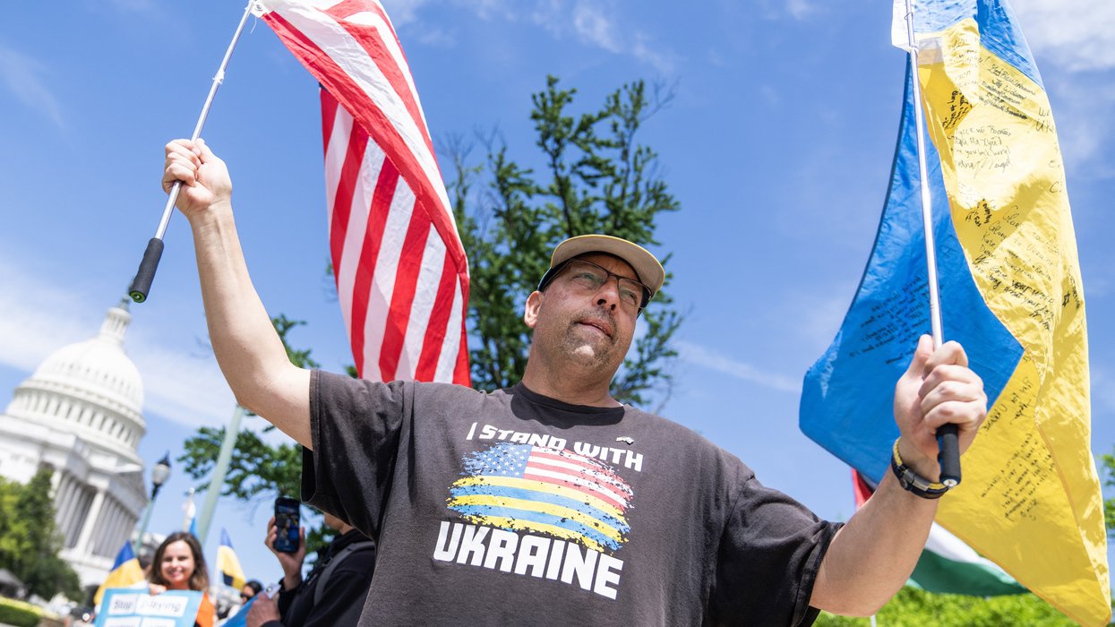 Man waving U.S. and Ukrainian flags