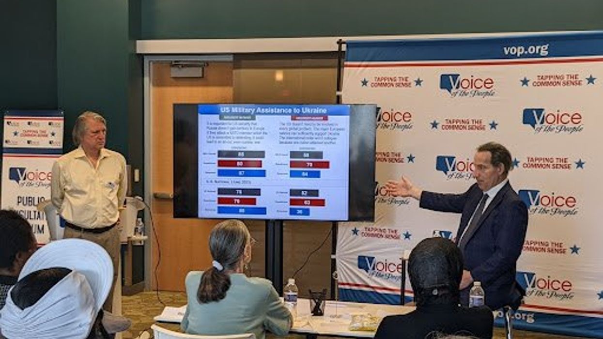 Many showing data to a group of people