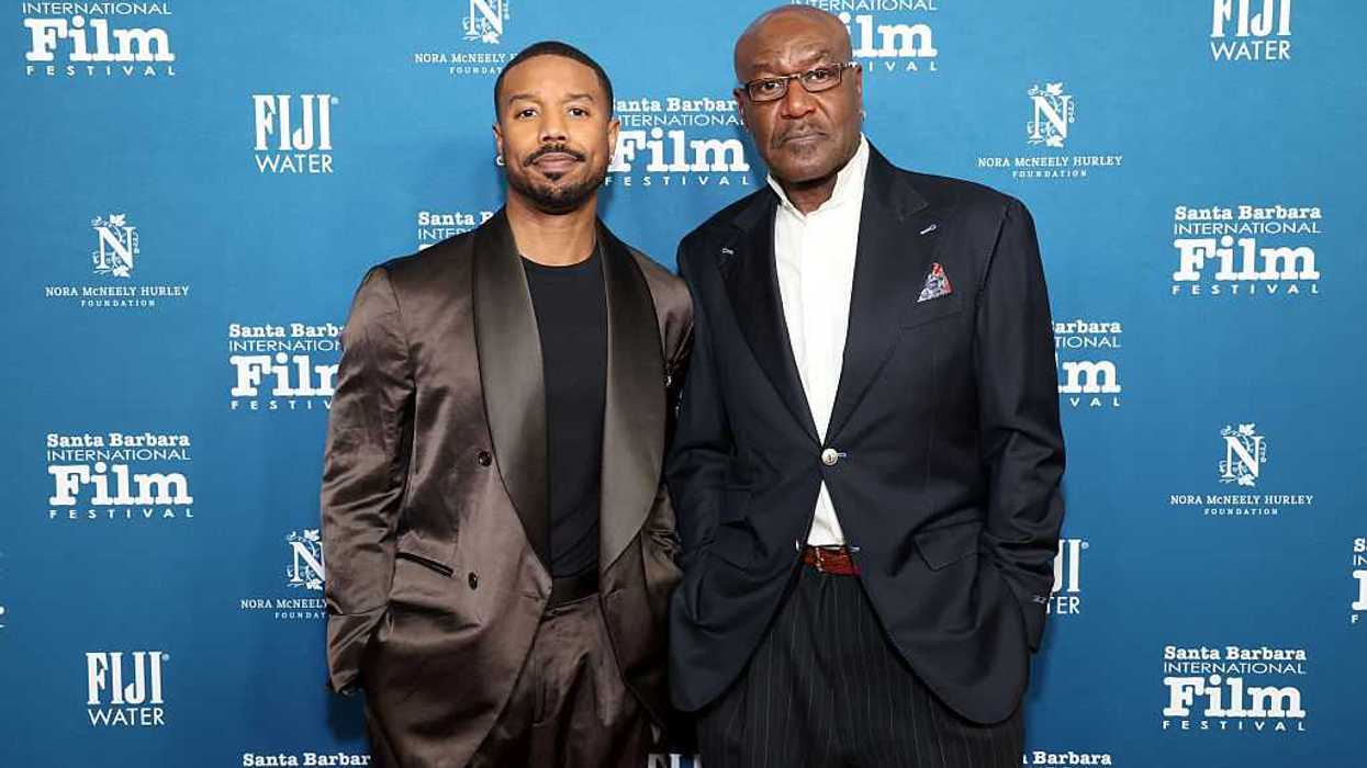 Michael B. Jordan standing next to Delroy Lindo