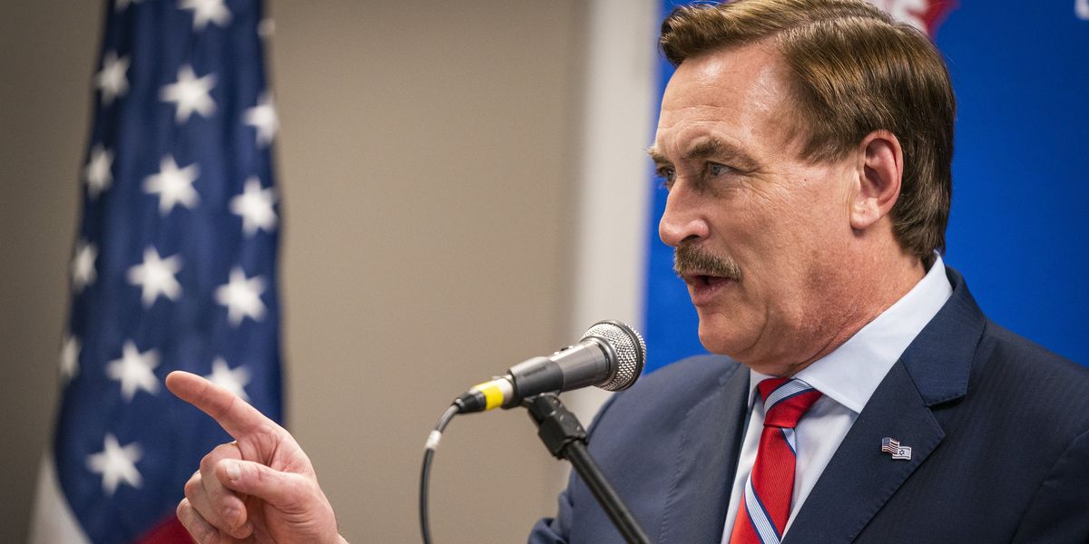 Mike Lindell speakin at a microphone