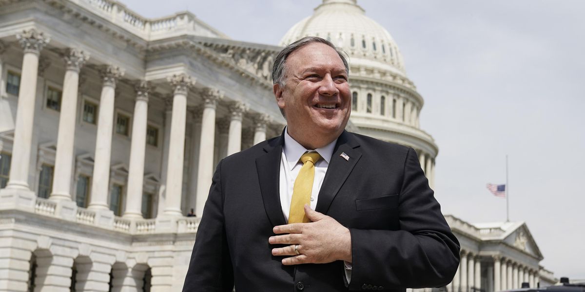 Mike Pompeo standing in front of the Capitol