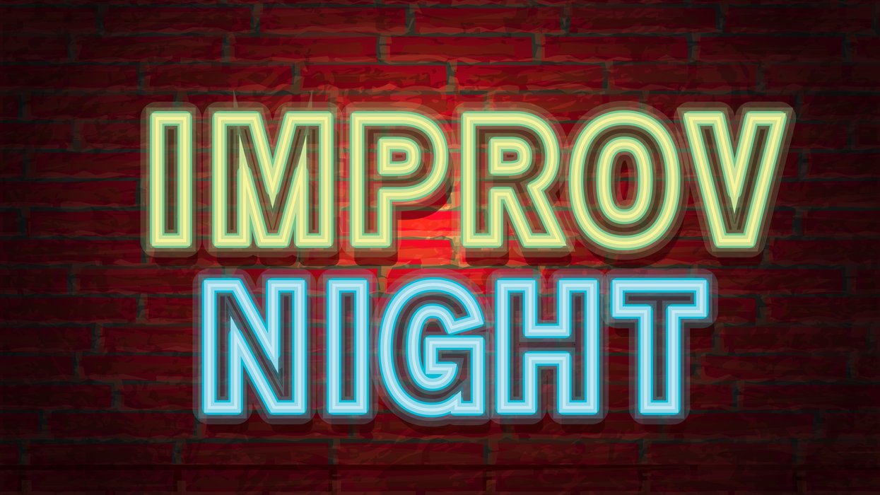 Neon lights that read "Improv Night"