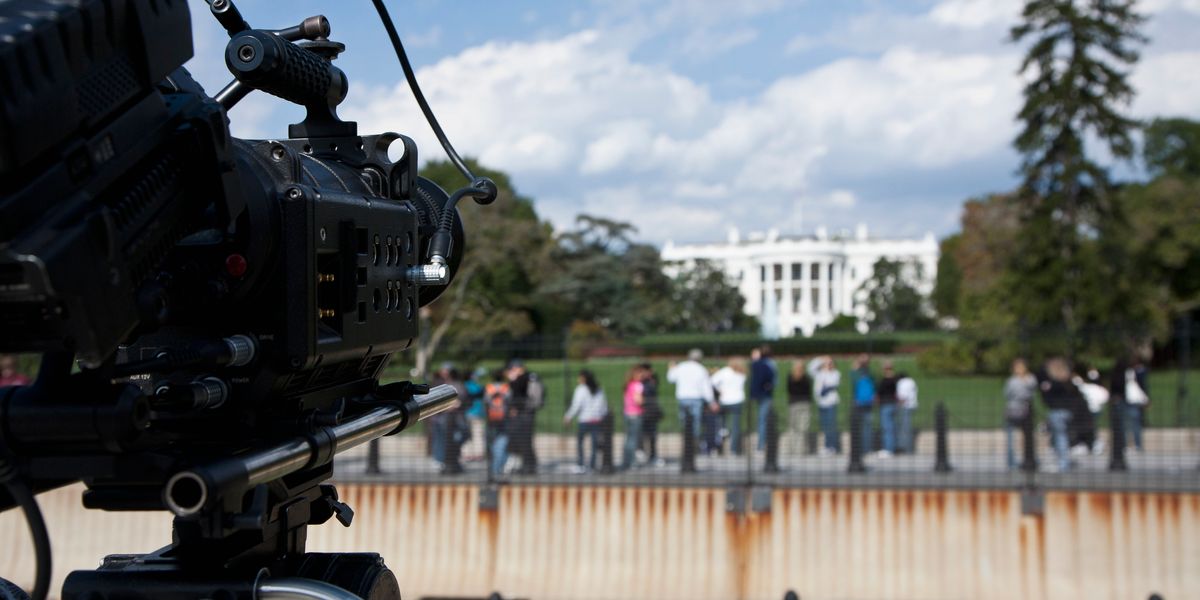 News camera pointed at White House