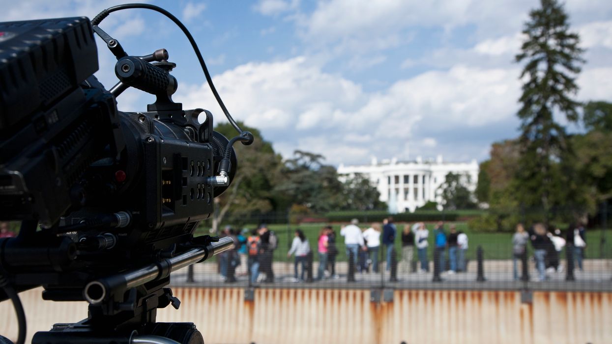News camera pointed at White House