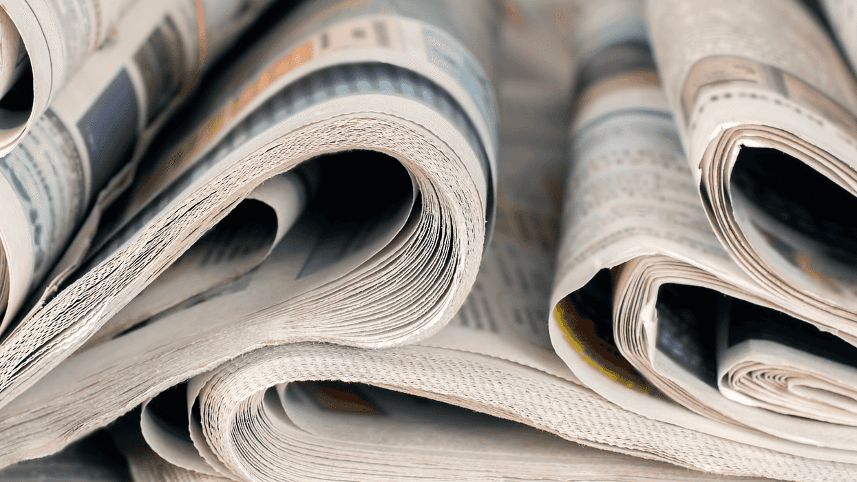 Newspapers folded over.