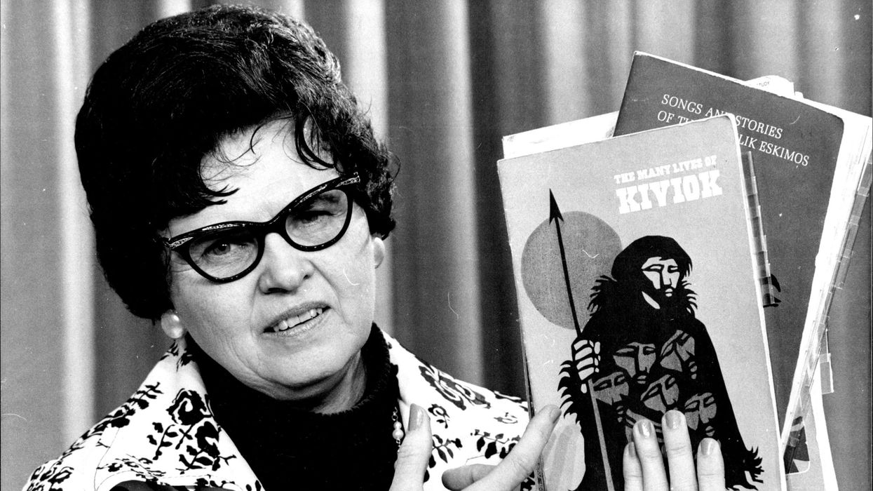 Norma Gabler holding books