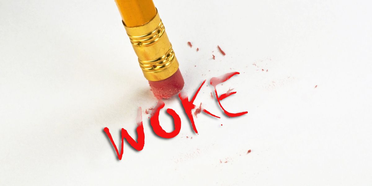 Pencil erasing the word "woke"