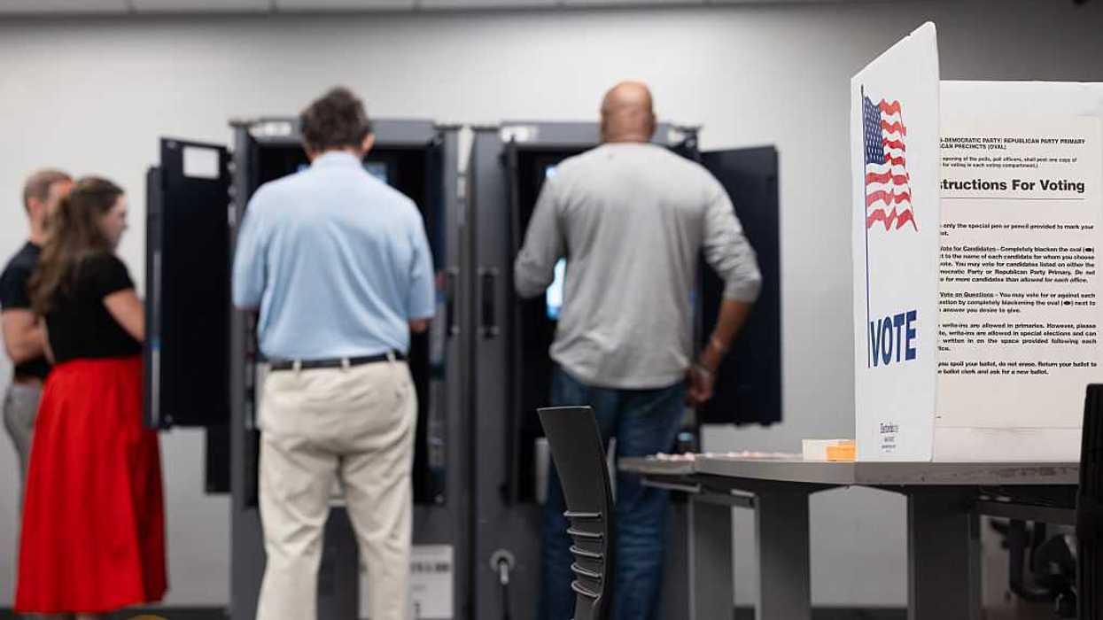 People casting their ballots.