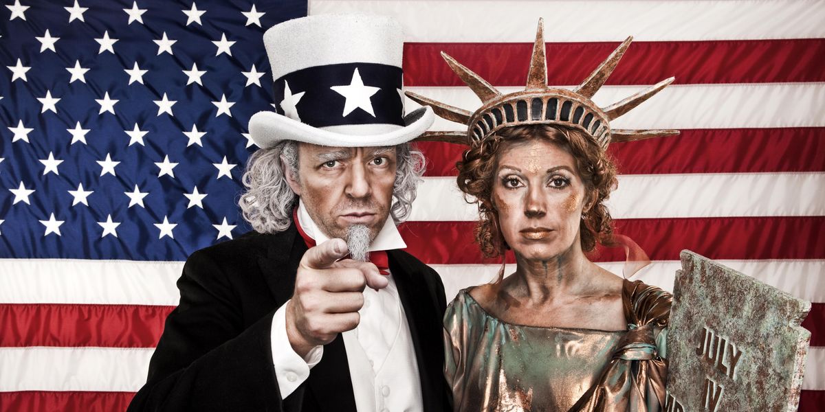 People dressed as Uncle Sam and the Statue of Liberty