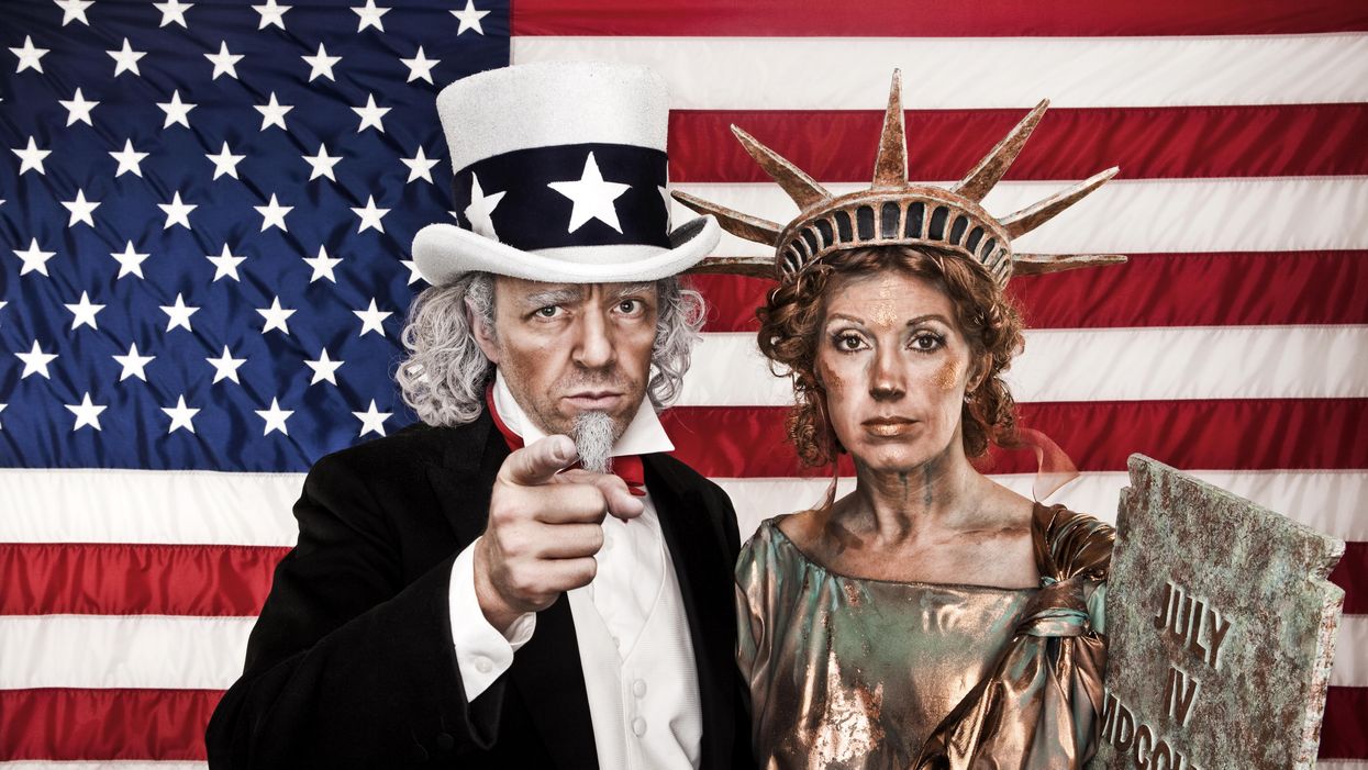 People dressed as Uncle Sam and the Statue of Liberty