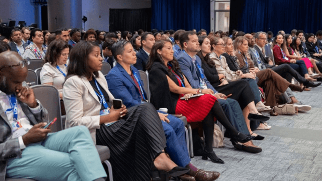 people gather for a conference