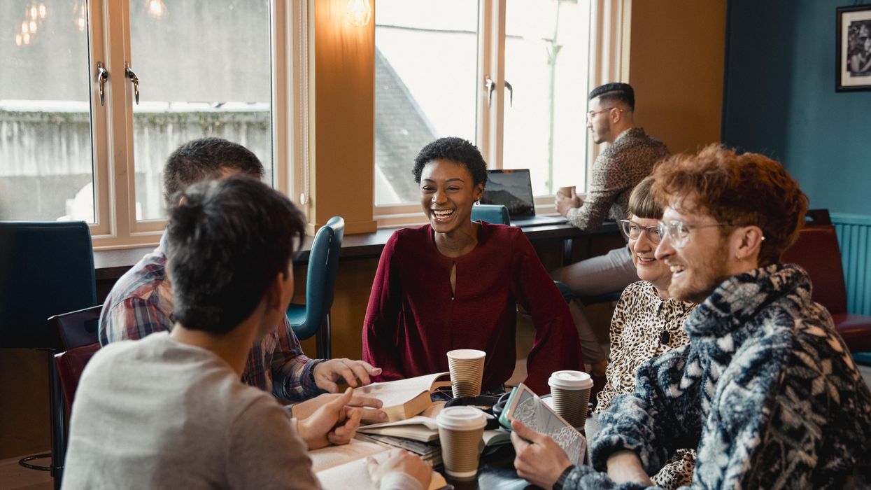 People having a discussion over coffee