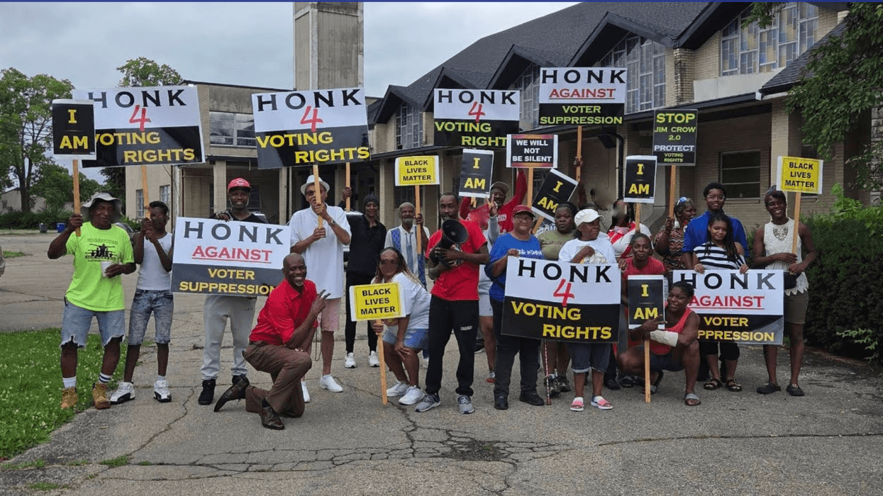 People holding signs