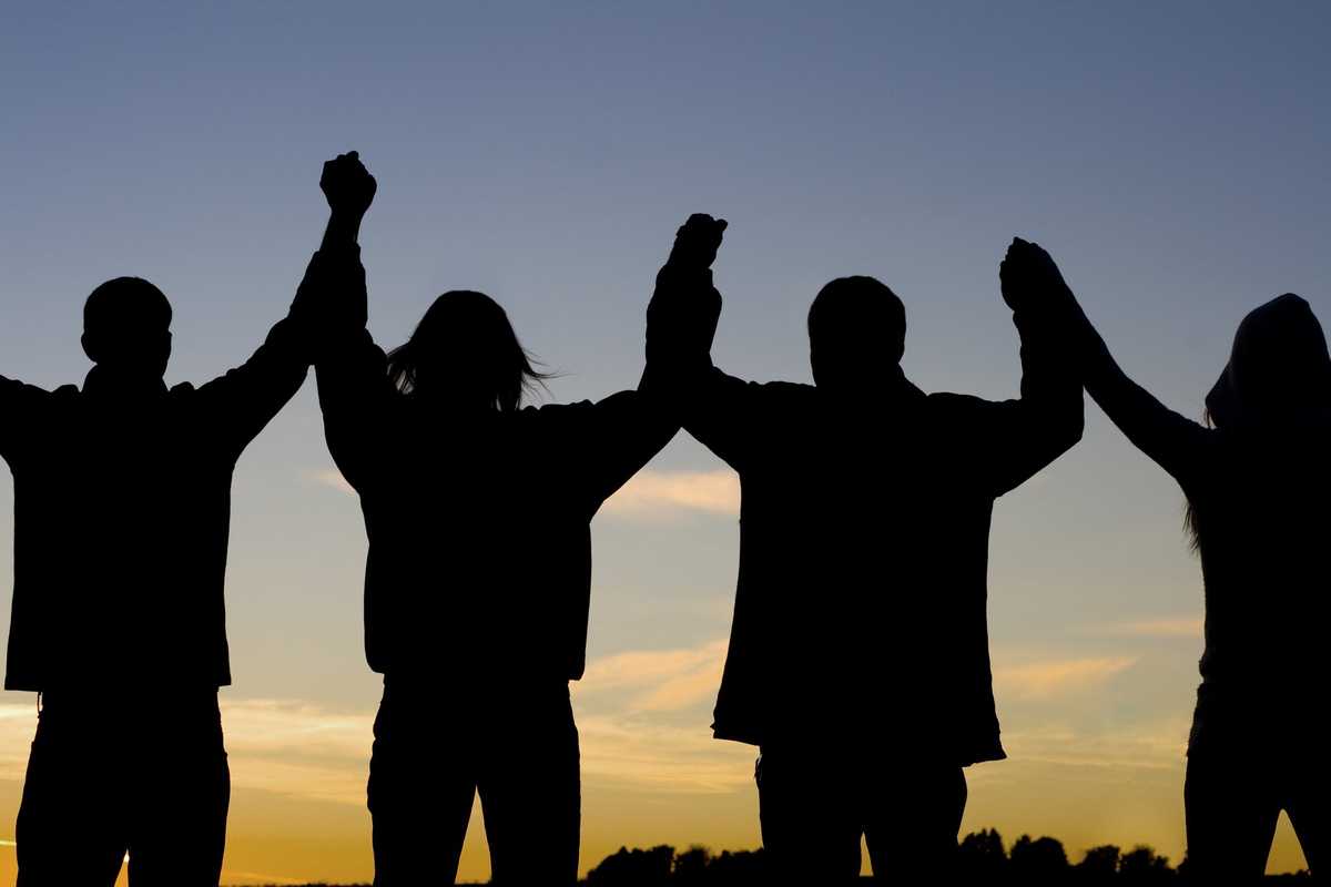 People joined hand in hand.