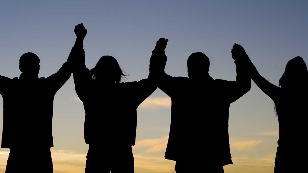 People joined hand in hand.