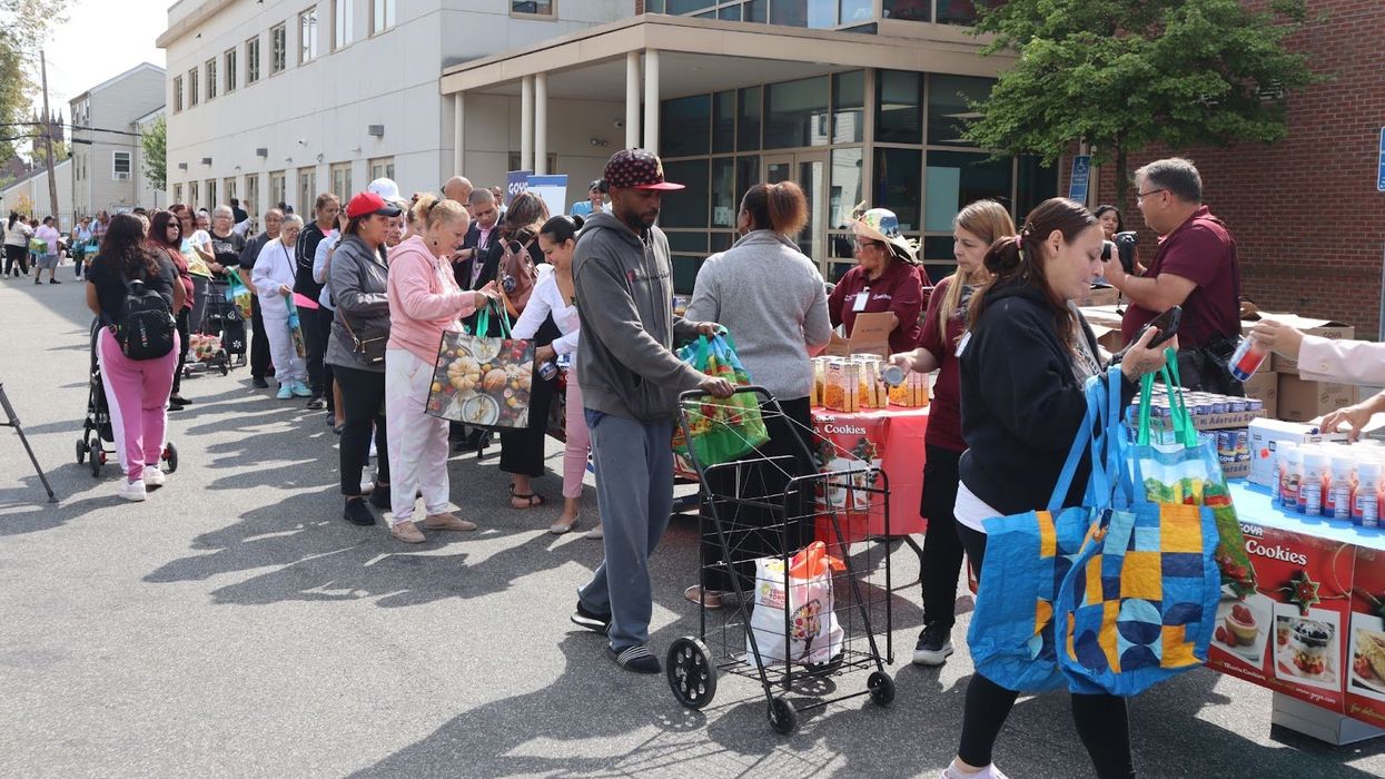 People lined up to get food