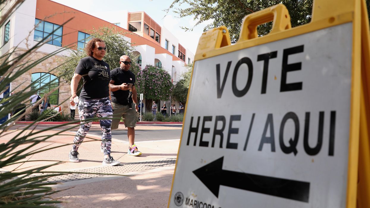 People outside a Maricopa County, Ariz., voting center
