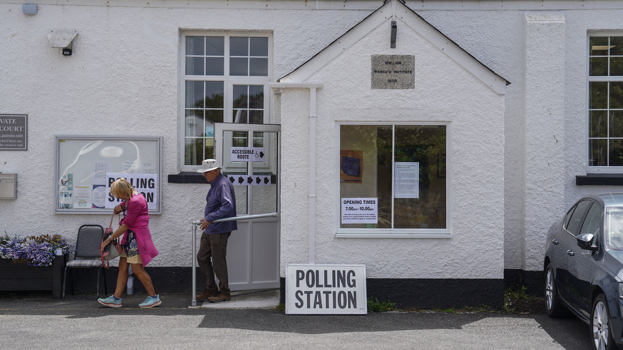 People walking out of a polling station