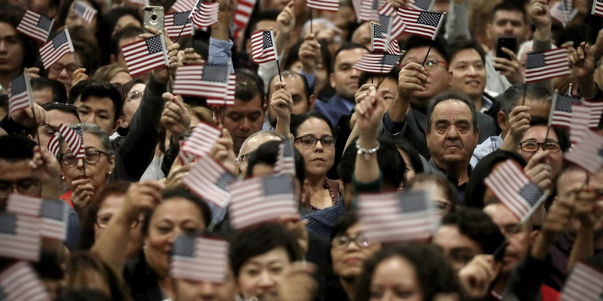 People wave American flags