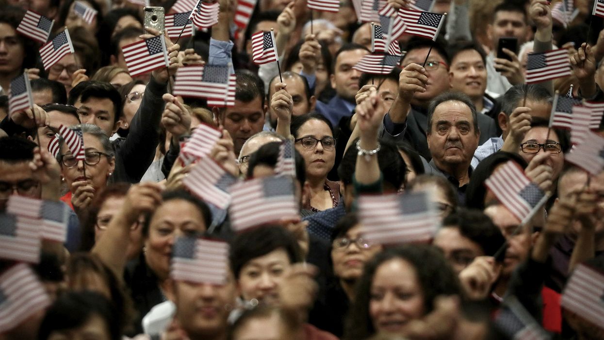 People wave American flags