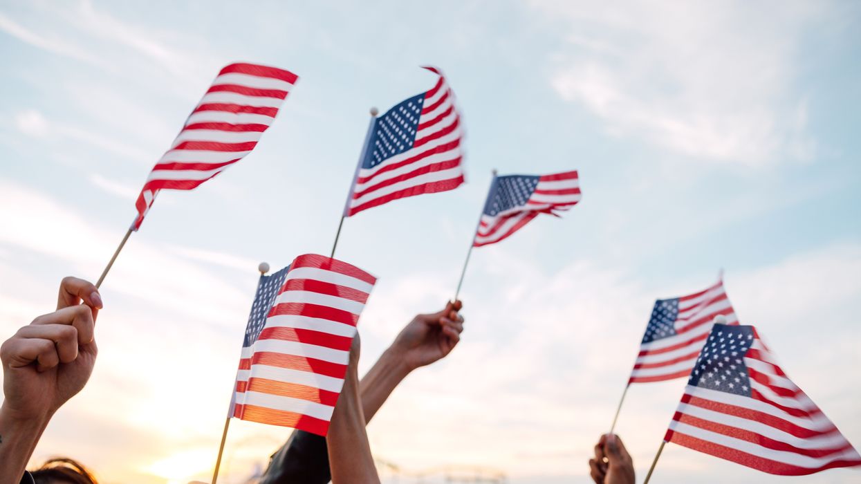 People waving US flags