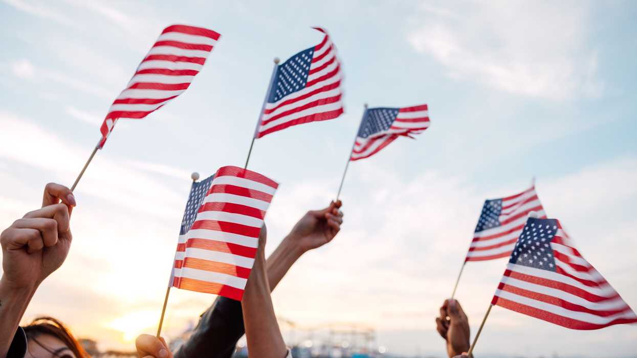People waving US flags