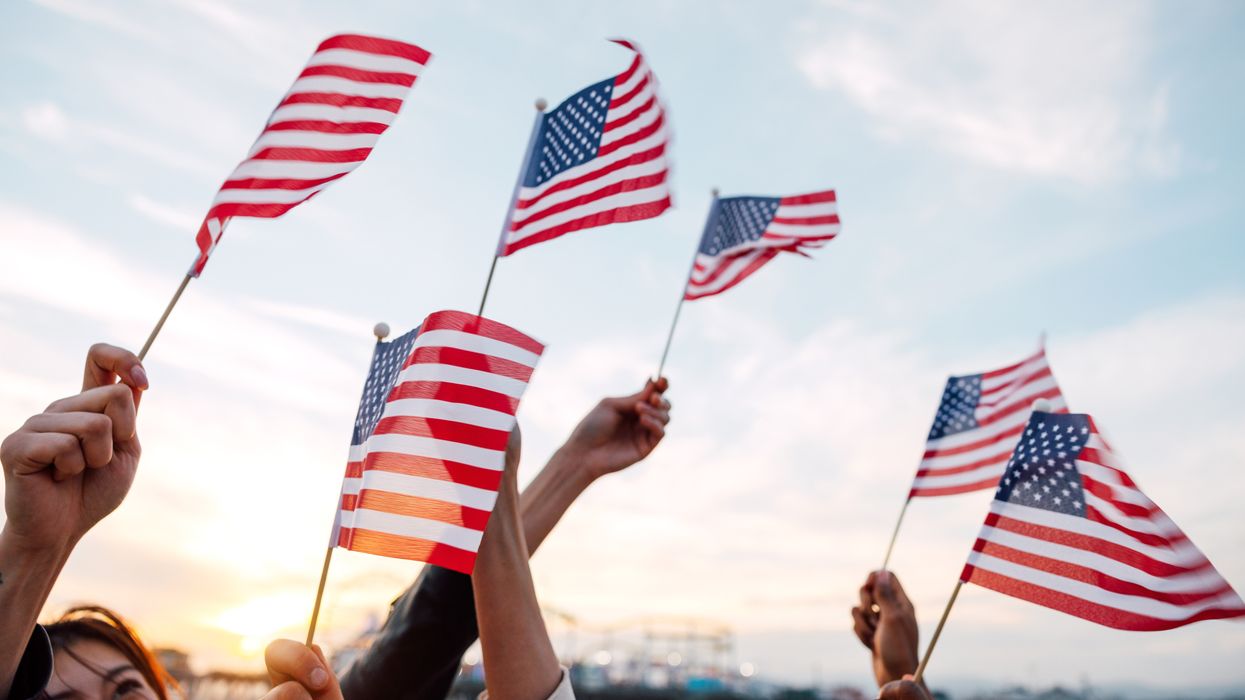 People waving US flags