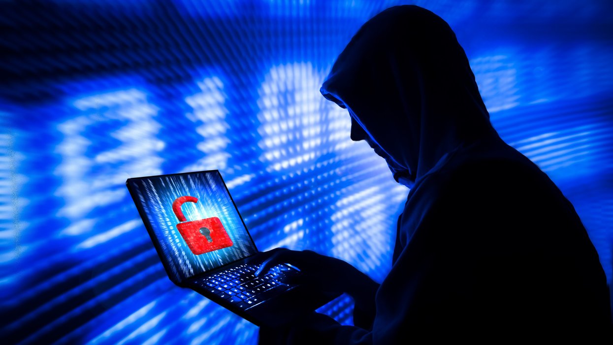 person hacking a website