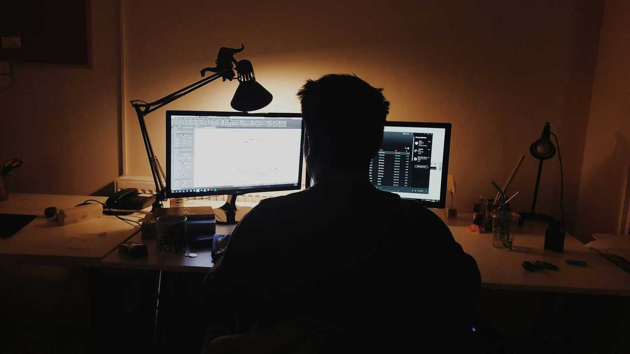 person reading a computer screen