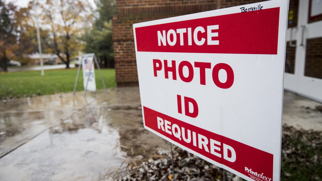 "Photo ID required" sign