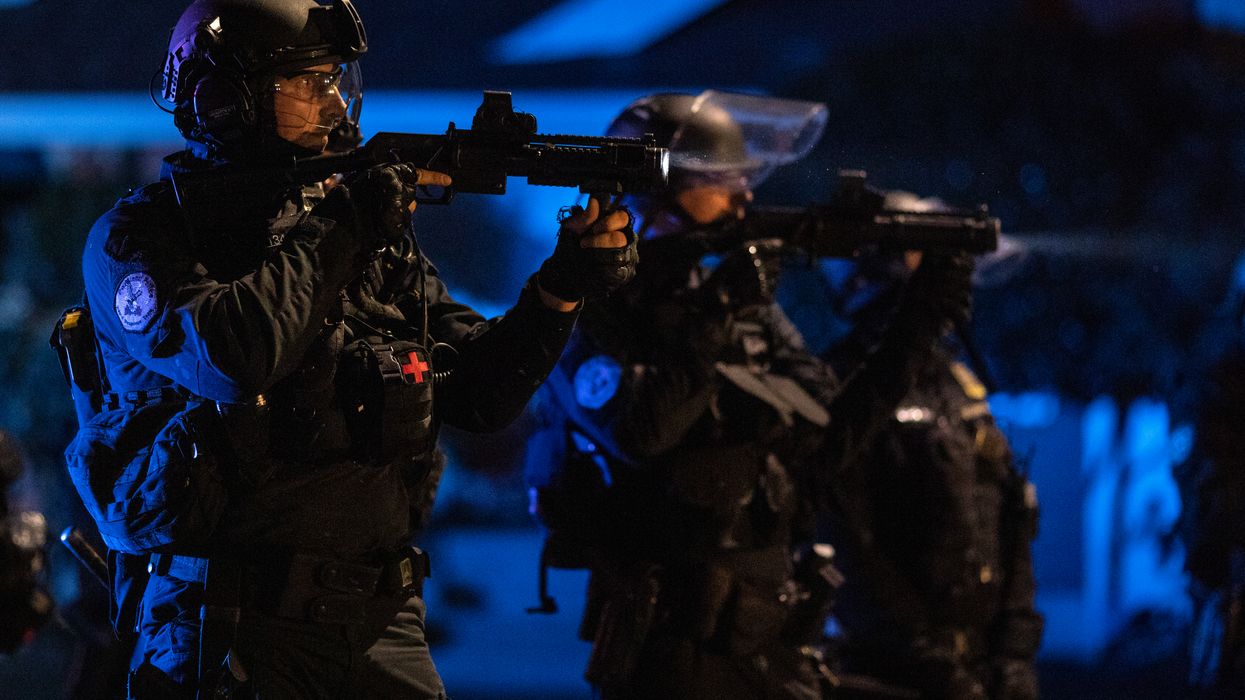 Police in riot gear during Portland, Ore., protests