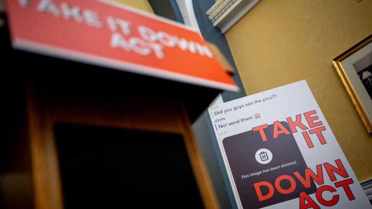 Posters are displayed next to Sen. Ted Cruz (R-TX) as he speaks at a news conference to unveil the Take It Down Act to protect victims against non-consensual intimate image abuse, on Capitol Hill on June 18, 2024 in Washington, DC.