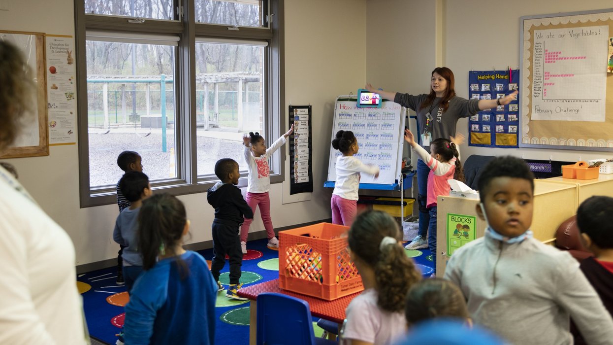 Pre-school students and teachers in a classroom